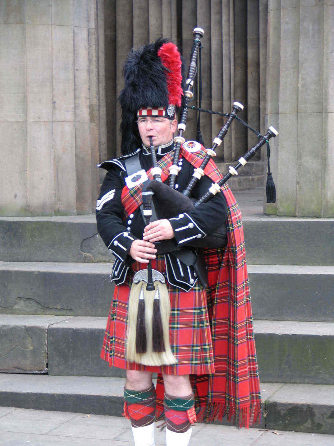 man playing bagpipes